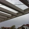 Pergola a sbalzo con tiranti e policarbonato