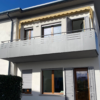 Ringhiera per terrazzo modello privacy in lamiera grigia intagliata al laser con tondini superiori